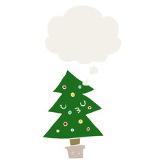 cartoon christmas tree and thought bubble in retro style