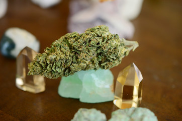 Cannabis and Crystals. Marijuana flower with healing crystal assortment. Citrine crystals. Medical...