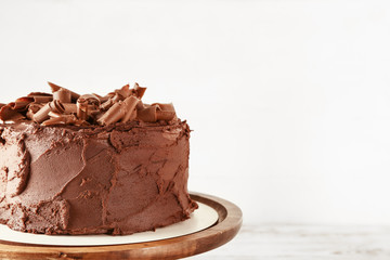 Tasty chocolate cake on table