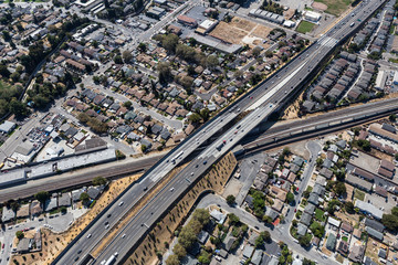 Aerial view of streets, buildings and traffic along the 238 freeway railroad overpass near Oakland...