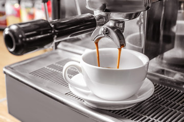 Coffee machine making coffee, closeup