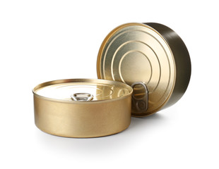Tin cans with food on color background
