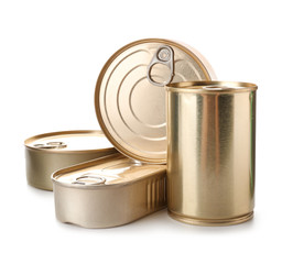 Tin cans with food on color background