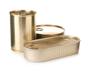 Tin cans with food on color background