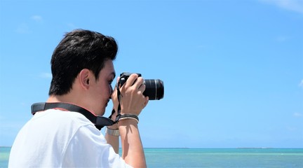 Obraz premium カメラを構える男性