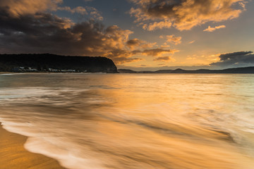 Naklejka premium High Tide Swells Up Sunrise Seascape