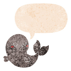 cute cartoon whale and speech bubble in retro textured style