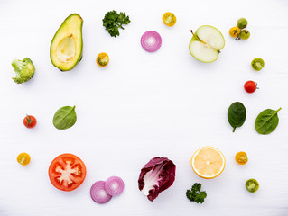 Food background and salad concept with raw ingredients  flat lay on white wooden background.