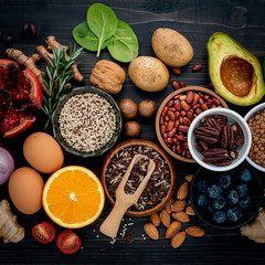 Fototapeta na wymiar Ingredients for the healthy foods selection. The concept of healthy food set up on wooden background.