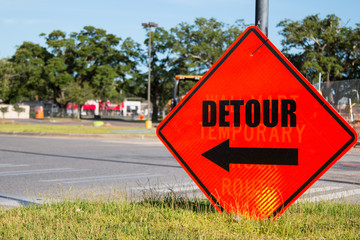 Detour sign indicating a road closure for construction. - 276037000