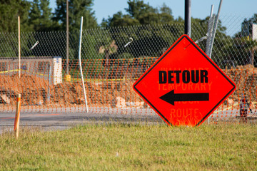 Detour sign indicating a road closure for construction. - 276037027