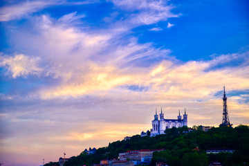 Naklejka premium Lyon, France and the Basilica of Notre-Dame de Fourvière at sunset.