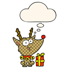 cartoon christmas reindeer and thought bubble in comic book style