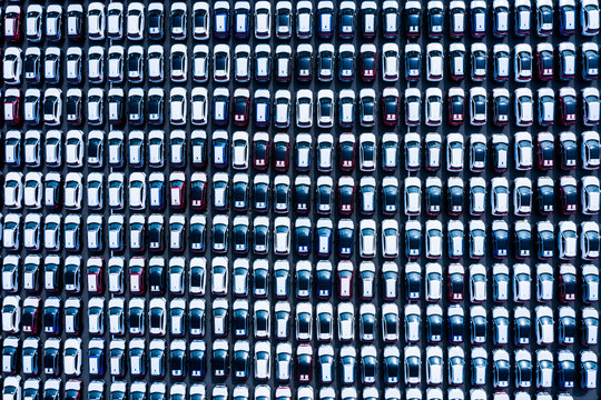 New ready to export cars in a parking lot from above