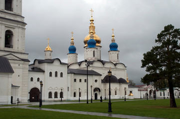 Fototapeta na wymiar Tobolsk Russia, view of St Sophia Assumption Cathedral with blue an gold domes from Kremlin square