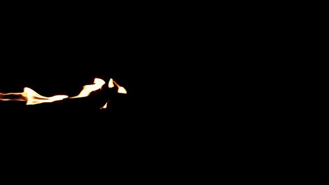 Slow motion flamethrower on black background