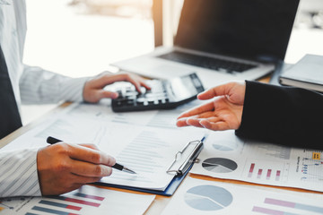 Business team meeting Strategy Planning with new startup project plan Finance and Economy Graph with laptop successful teamwork