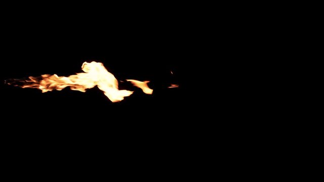 Slow motion flamethrower on black background