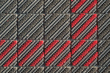 Square-shaped rough floor mat texture.