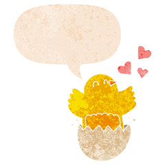 cute hatching chick cartoon and speech bubble in retro textured style