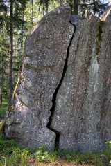 cracked boulder in the forest, Imatra Finland