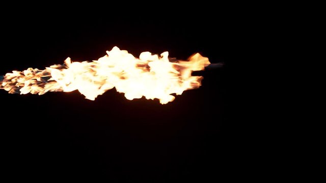 Slow motion flamethrower on black background