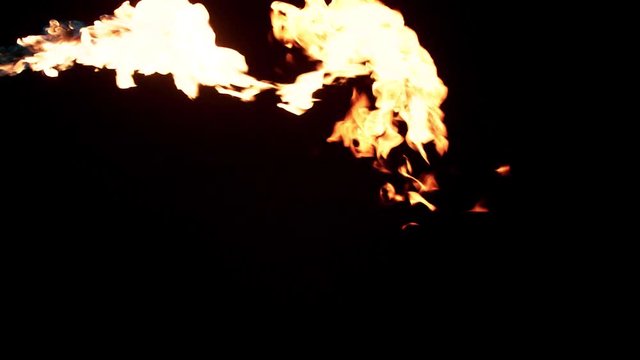 Slow motion flamethrower on black background