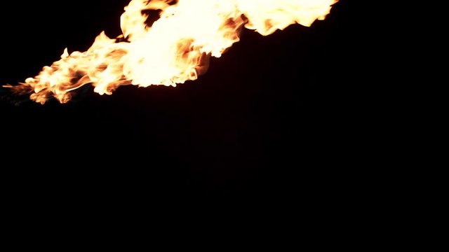Slow motion flamethrower on black background