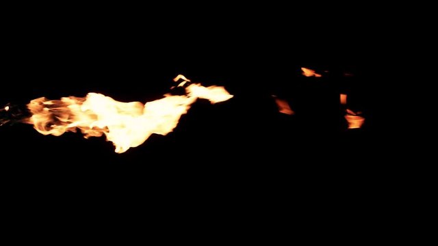 Slow motion flamethrower on black background