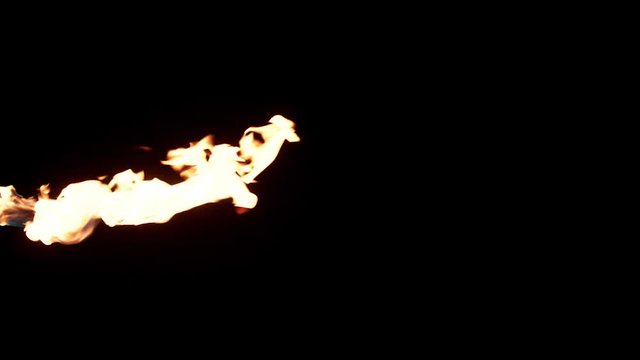 Slow motion flamethrower on black background