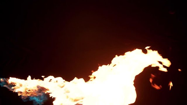 Slow motion flamethrower on black background