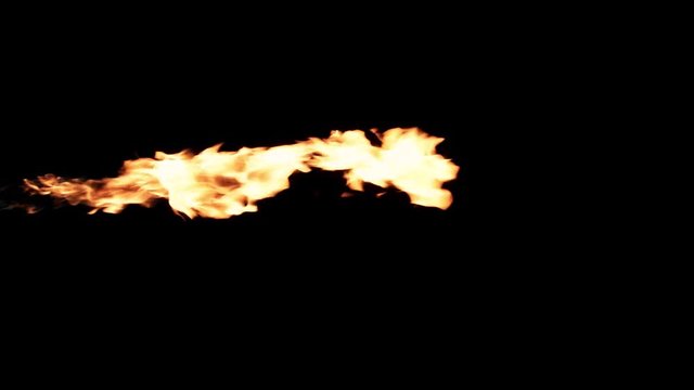 Slow motion flamethrower on black background