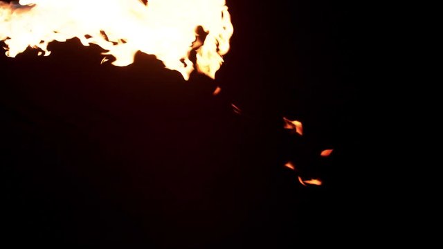 Slow motion flamethrower on black background