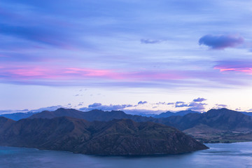 Fototapeta na wymiar Wanaka Roys peak Sunrise View Over Mountains And Lake In New Zealand