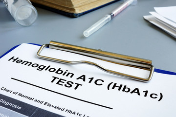 Hemoglobin A1C HbA1c Test form on desk.