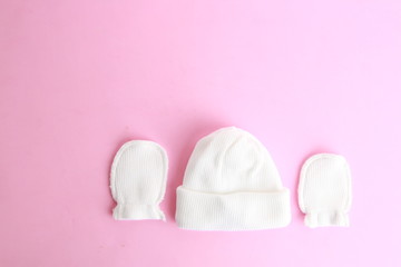 white wool hat and mittens for baby