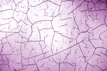 Cracked paint texture in purple color.