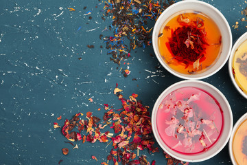 herbal tea in cups on a wooden background
