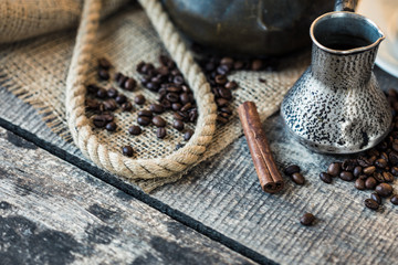 Everything for making real coffee. Cup,Turkish coffee pot, coffee beans