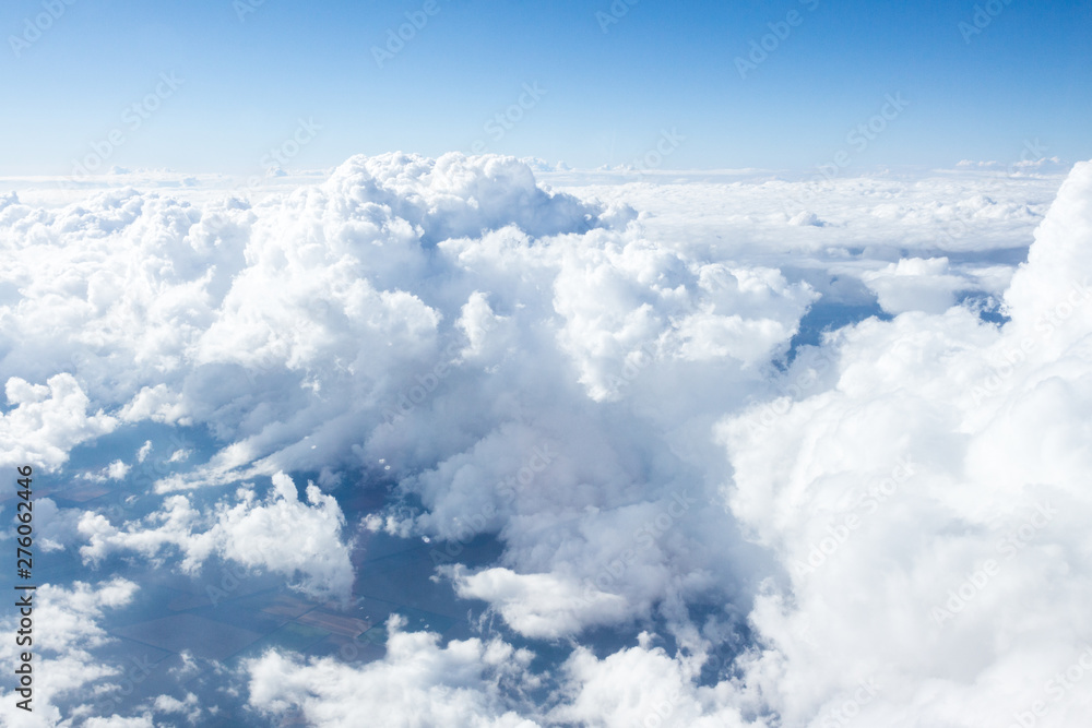 Wall mural clouds and sky from airplane window view