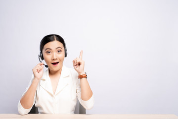 Woman operator in headset with blank copy space isolated white background