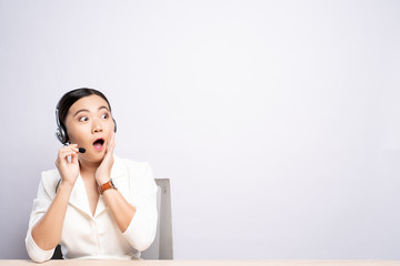 Woman operator in headset with blank copy space isolated white background