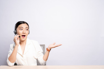 Woman operator in headset with blank copy space isolated white background