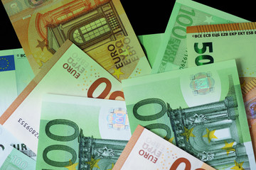 One Hundred and Fifty euro banknotes green color toned close up