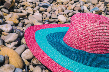 Summer straw hat pamela on the beach