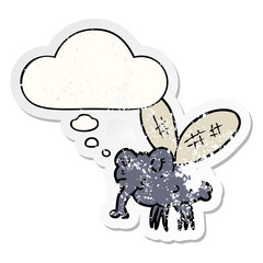 cartoon fly and thought bubble as a distressed worn sticker