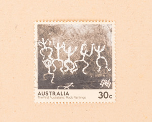 AUSTRALIA - CIRCA 1970: A stamp printed in Australia shows the first australian rock paintings,...