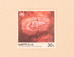 AUSTRALIA - CIRCA 1970: A stamp printed in Australia shows the first australian rock paintings, circa 1970