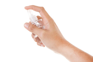 Hand Holding Spray Bottle. ISOLATED ON WHITE BACKGROUND.