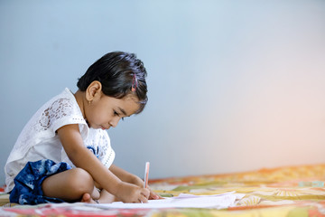 indian child studying at home
